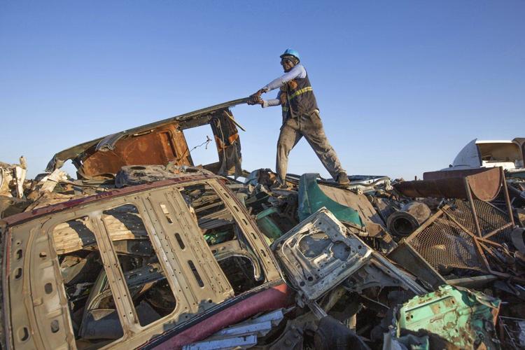 Zimbabwe's scrap metal hunters are quietly fighting climate change one piece at a time