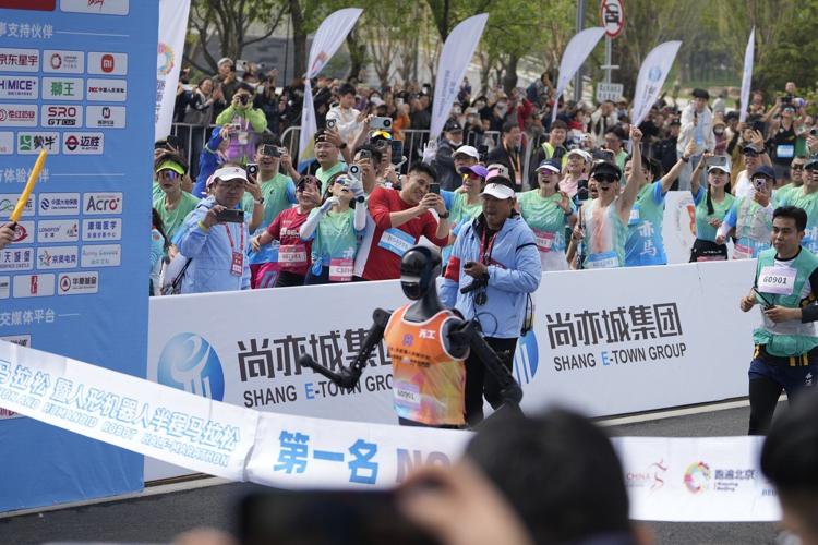 No sweat: Humanoid robots run a Chinese half-marathon alongside flesh-and-blood competitors