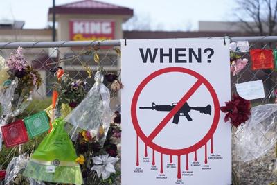 Son of Colorado mass shooting victim sues gun-maker Ruger