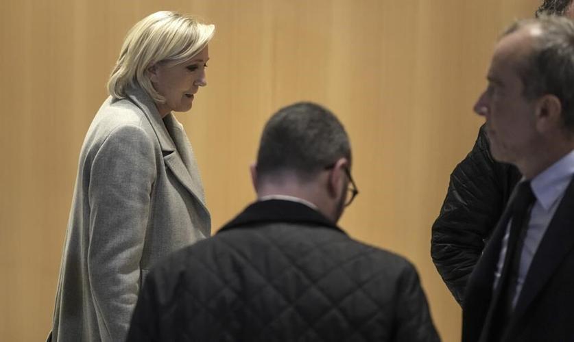 France's Le Pen denies wrongdoing as she and her party go on trial accused of embezzling EU funds