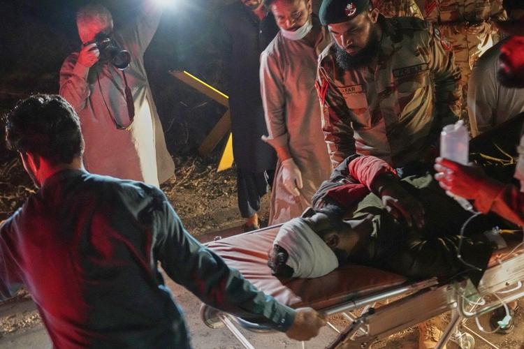 Pakistan says insurgents who attacked a passenger train killed 21 hostages while all others freed