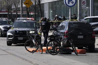 Two dead, officers injured in foot pursuit after Toronto shooting, police say