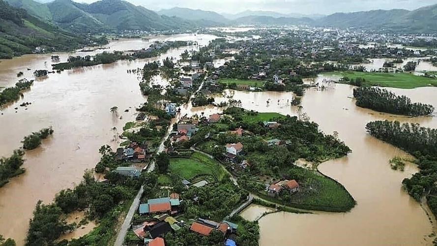 Vietnam storm deaths rise to 64 as a bridge collapses and flooding sweeps away a bus