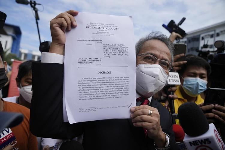 Philippine court acquits former justice minister of drug charges after key witnesses said they lied