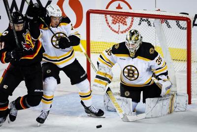 Bruins win 8th straight, Ullmark frustrates Flames with 54 saves