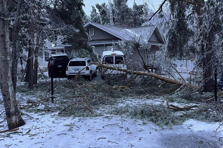 Rain turns to ice, cuts power in Great Lakes region while Tennessee braces for wild weather