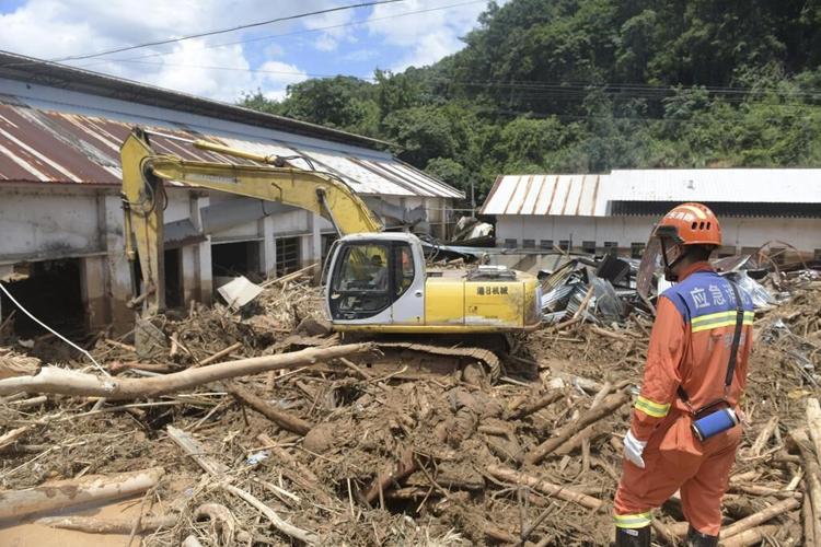 Historic flooding in China's Guangdong kills nine, warnings issued for other parts of country