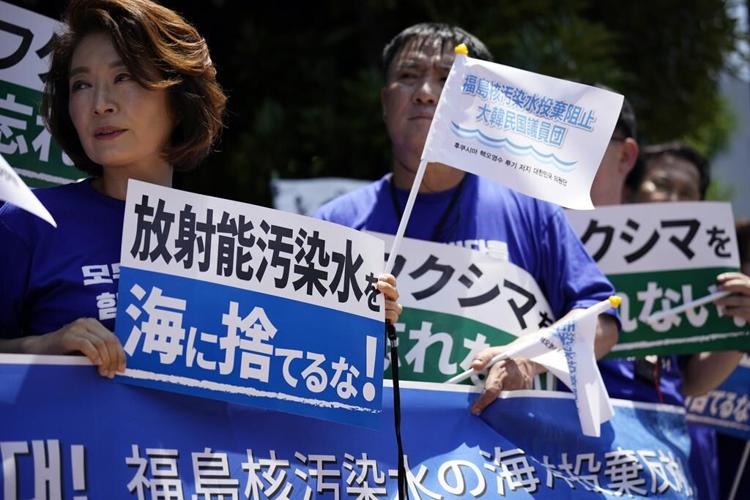 Japan defends neutrality of IAEA report on Fukushima water release plan as minister visits plant