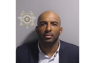 A Trump supporter indicted in Georgia is also charged with assaulting an FBI agent in Maryland