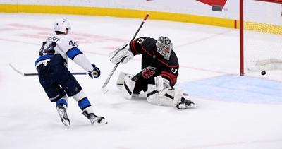 Morrissey caps two-goal effort with OT winner to lead Jets to 4-3 win over Hurricanes