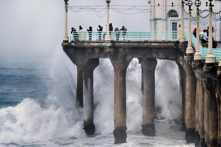California residents on edge as high surf and flooding threats persist on Christmas Eve