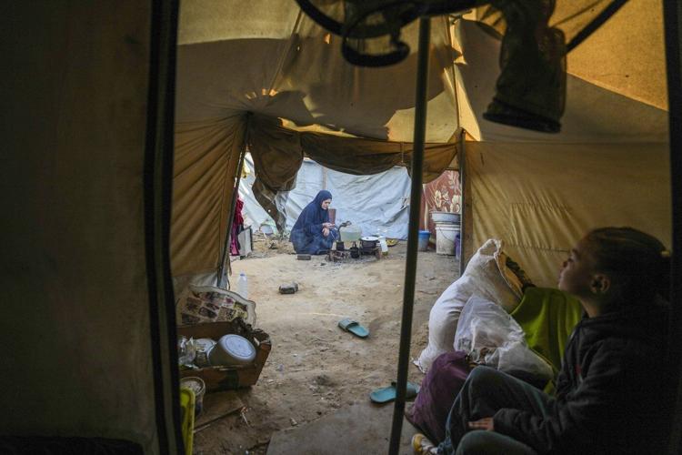 In Gaza's crowded tent camps, women wrestle with a life stripped of privacy