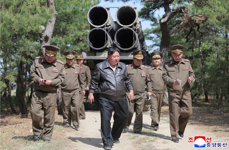 North Korea says leader Kim supervised missile tests simulating nuclear strikes against rivals