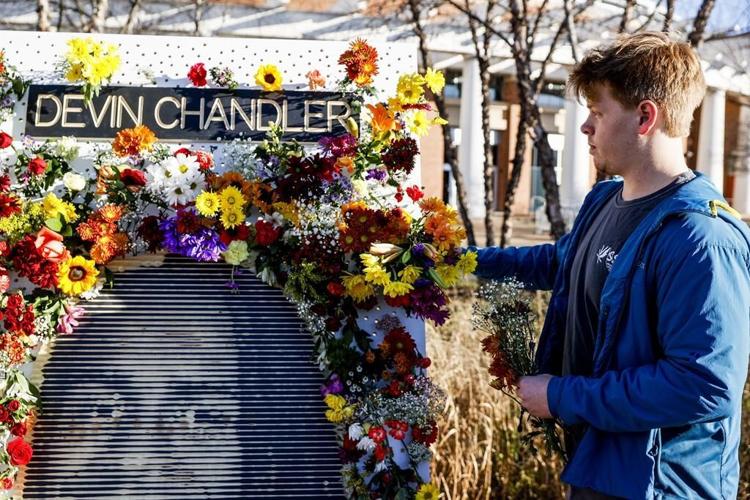 Virginia honors slain players in memorial service on campus