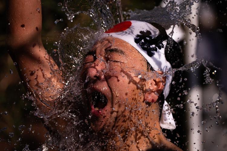 Braving the cold: Tokyo's New Year's ritual of ice baths, in photos