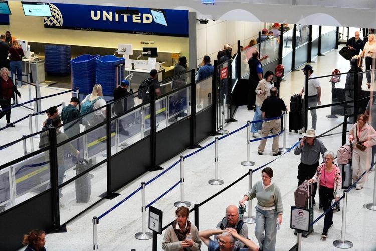 US travelers scramble to adjust as airlines cut flights because of shutdown