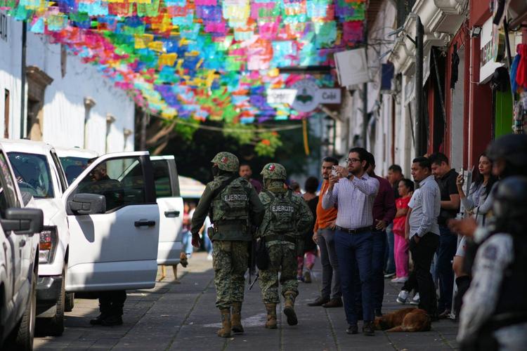 Authorities arrest 7 bodyguards in connection with a Mexican mayor's assassination