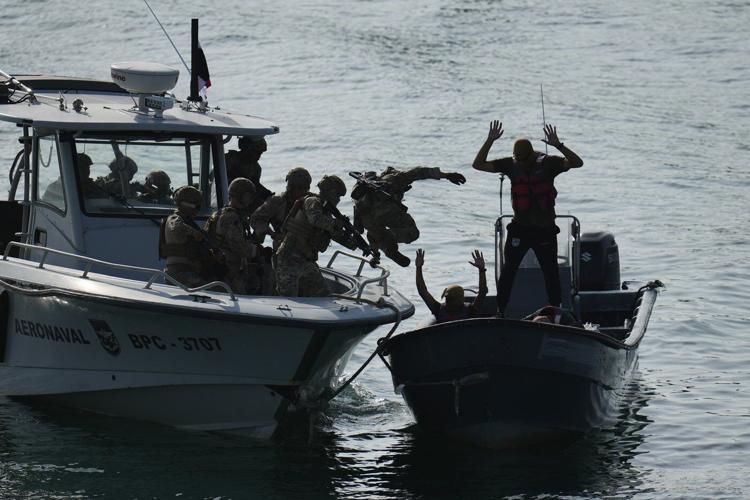 After killing hundreds in boat strikes, US military expands campaign on land in Latin America