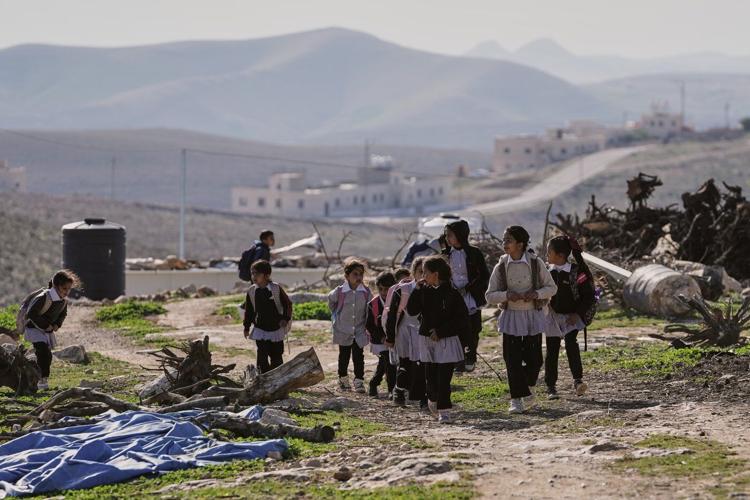 Israeli settlers block Palestinian kids' path to school with tear gas and barbed wire