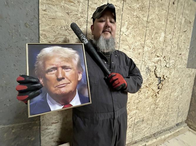 Clients of Halifax 'rage room' take aim at portraits of U.S. President Donald Trump