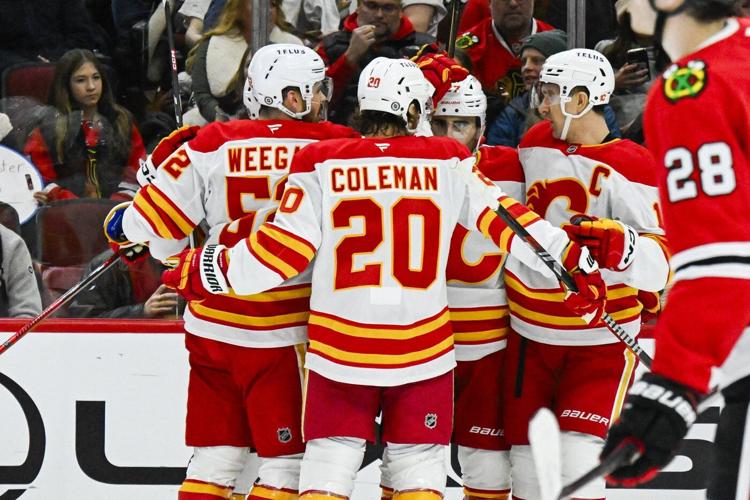 Pelletier scores twice as hot Flames beat Blackhawks 5-2