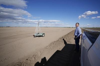 A plan to replenish the Colorado River could mean dry alfalfa fields. And many farmers are for it