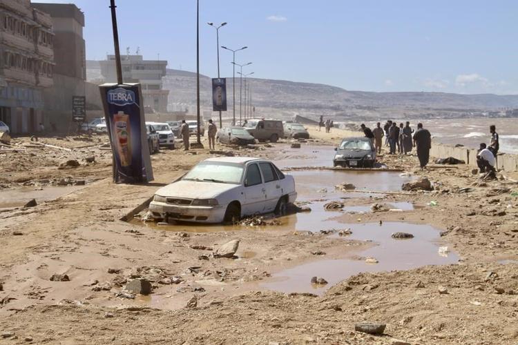 Libyan city buries thousands in mass graves after flood, while mayor says death toll could triple