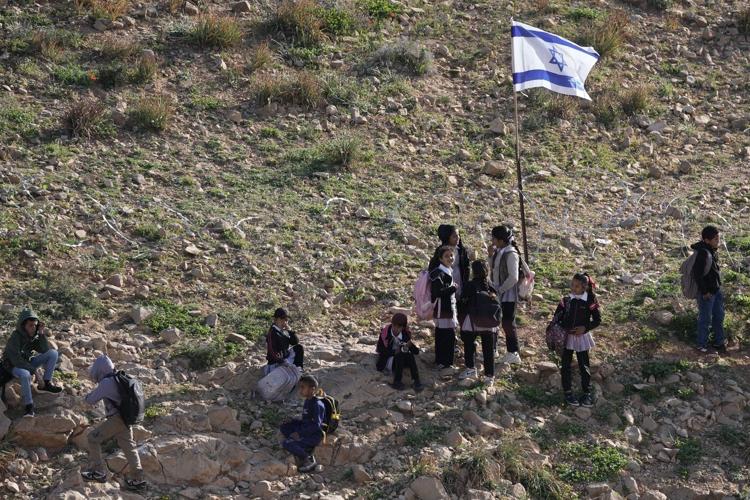 Israeli settlers block Palestinian kids' path to school with tear gas and barbed wire