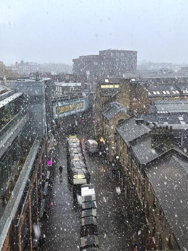 School closures and travel delays as Arctic air brings snow and sleet to parts of the UK