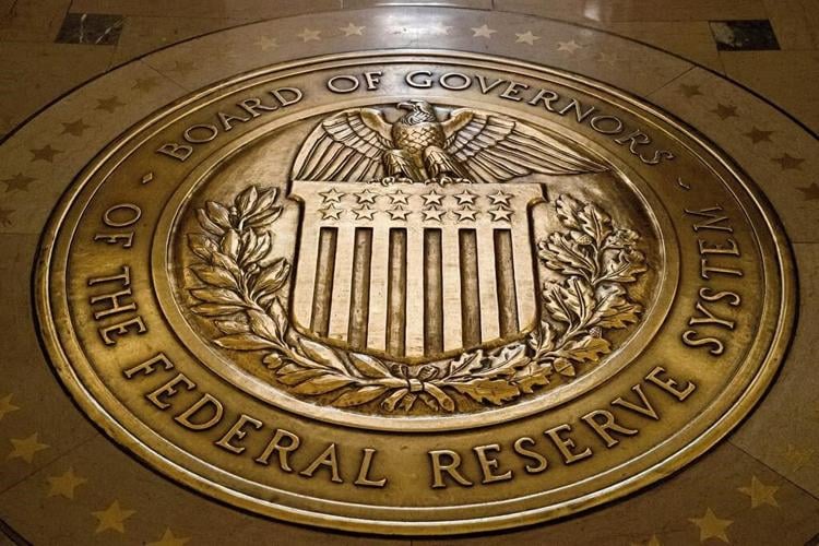Fed keeps rates unchanged but signals likelihood of another hike this year to fight inflation