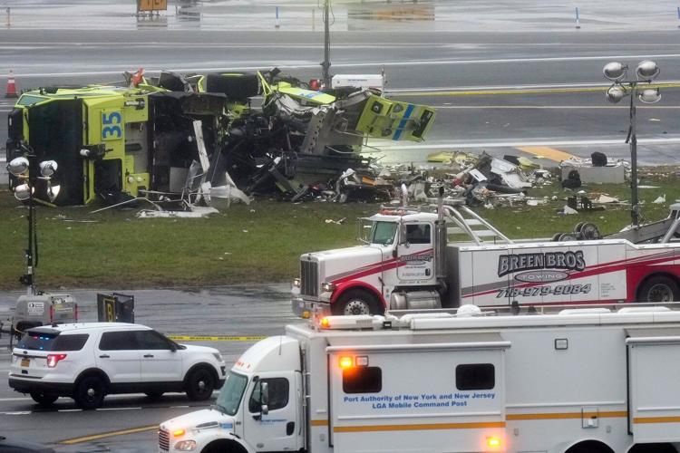 Photos show the scene of a collision on a runway at LaGuardia Airport in New York