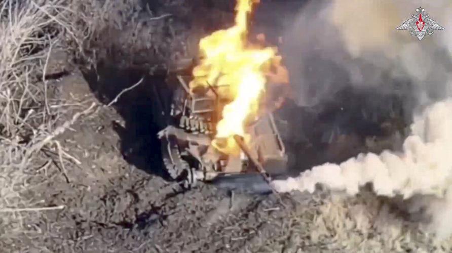 Russian forces bypass a key stronghold in a bid to cut off its supplies, a Ukrainian officer says