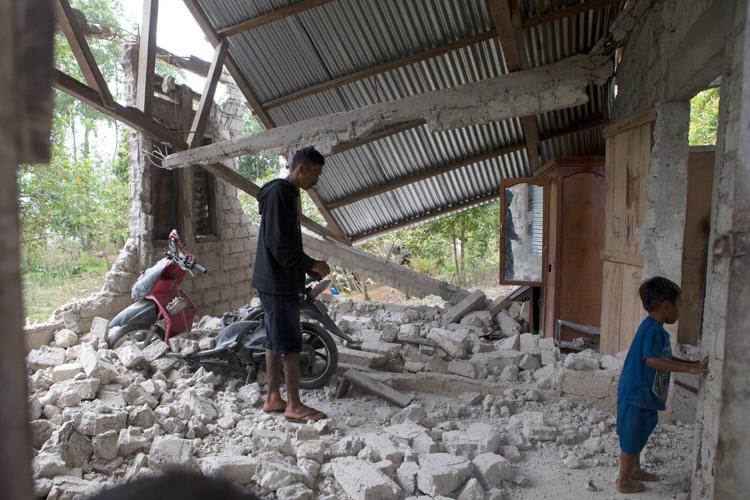 Rescuers in Indonesia recover 6 more bodies in earthquake aftermath, raising death toll to 53