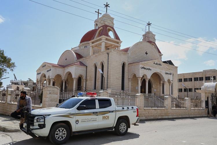 Sectarian attacks rock a Christian town in Syria after a dispute