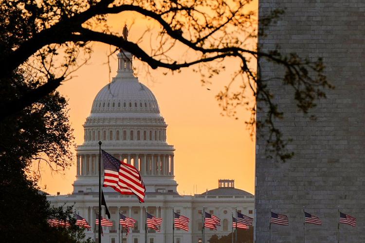 Who flies the American flag for holidays - and who never flies one, according to an AP-NORC poll
