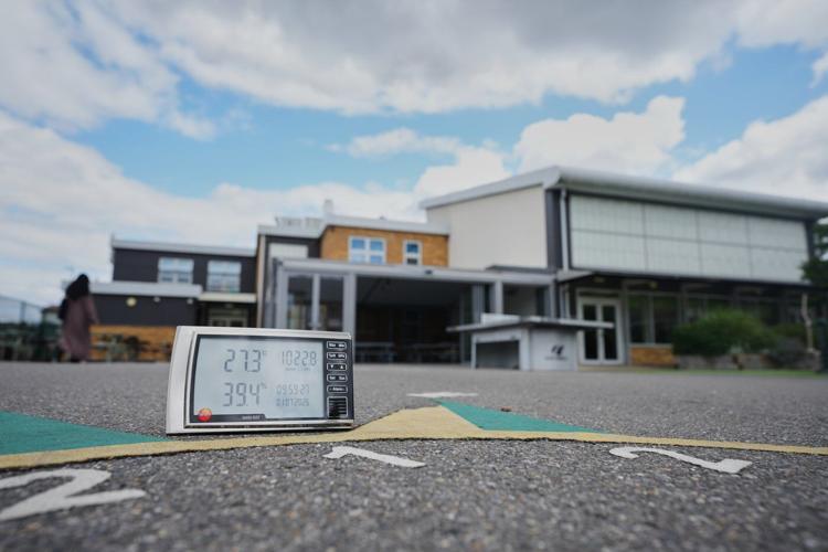With poor ventilation and children packed in, UK's outdated schoolhouses swelter in the heat