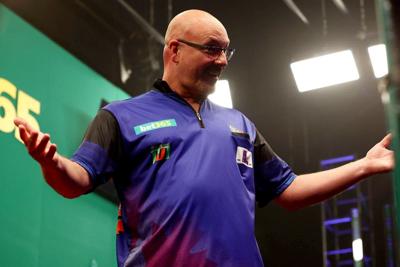 Retired autoworker (Gentleman) Jim Long loving life on the professional darts tour