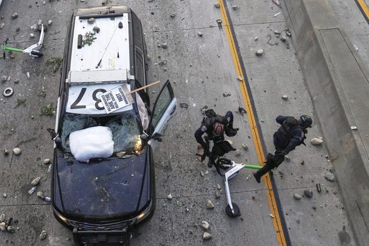 AP PHOTOS: Protesters clash with law enforcement in Los Angeles