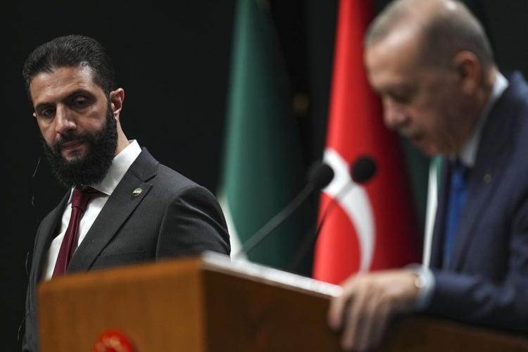 Syria's interim leader holds talks with key ally Turkey on his second international trip