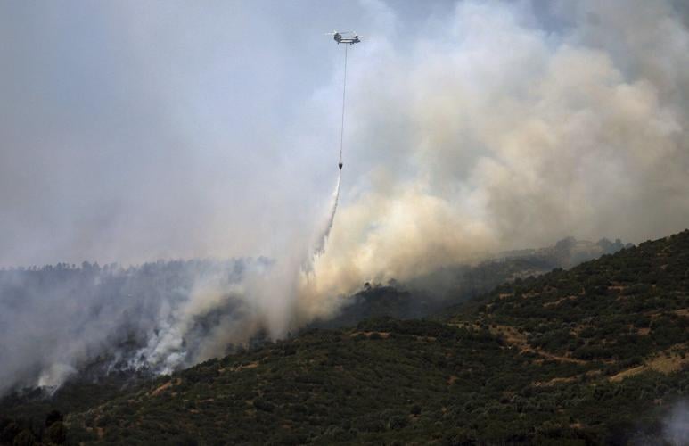 Turkey sends firefighting aircraft to Syria as wildfires rage on both sides of the border