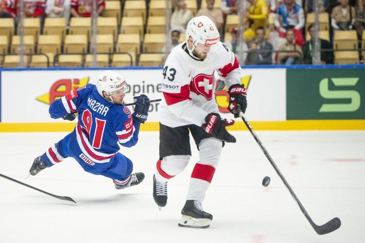 Switzerland shuts out US 3-0 at ice hockey worlds