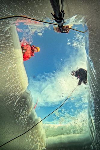 Scientists train to dive beneath polar ice as climate change warms the Arctic and Antarctica