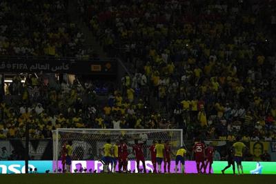 Stadium lights dim at Brazil-Switzerland World Cup game