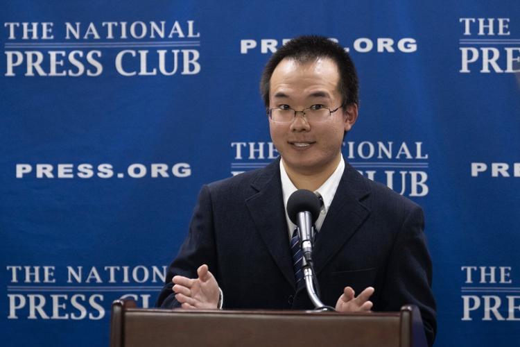 Son of Chinese journalist jailed for espionage calls for his father's release