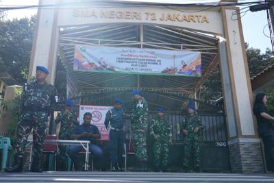 An Indonesian teen suspected in mosque attack built bombs alone at home, police say