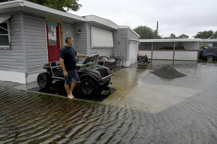 The Latest: Debby knocks out power to hundreds of thousands in Florida, Georgia