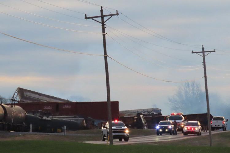Derailed train in Kentucky causes a chemical leak and sparks a fire