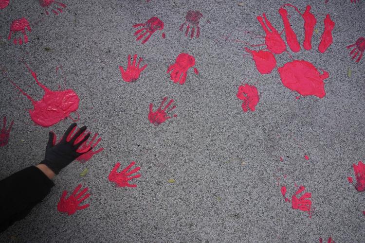 Thousands march in Serbia to mark 1 month since a roof collapse killed 15 people