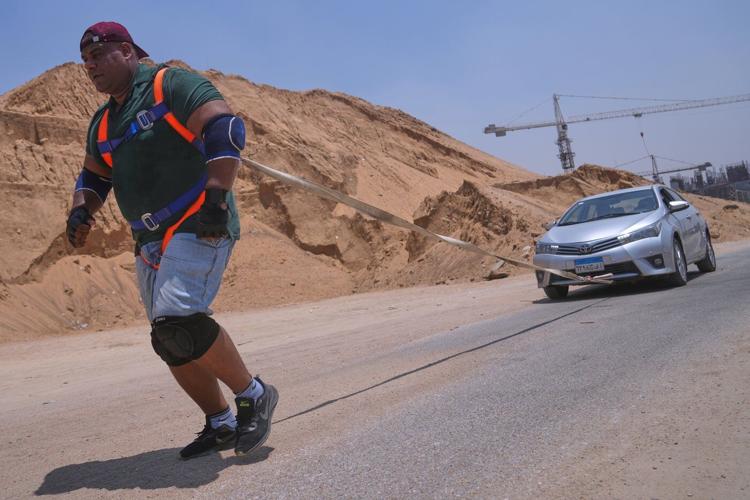 Photos of Egypt’s ‘strongman’ pulling ships, trains and cars in jaw-dropping feats