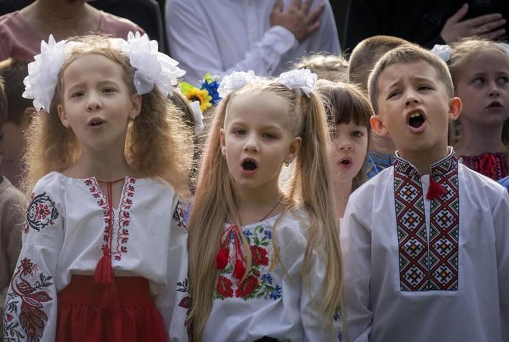 It's joy mixed with sorrow as Ukrainian children go back to school in the midst of war
